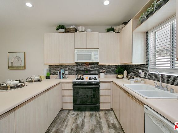 3rd image of 856 W Beach Ave Unit 13