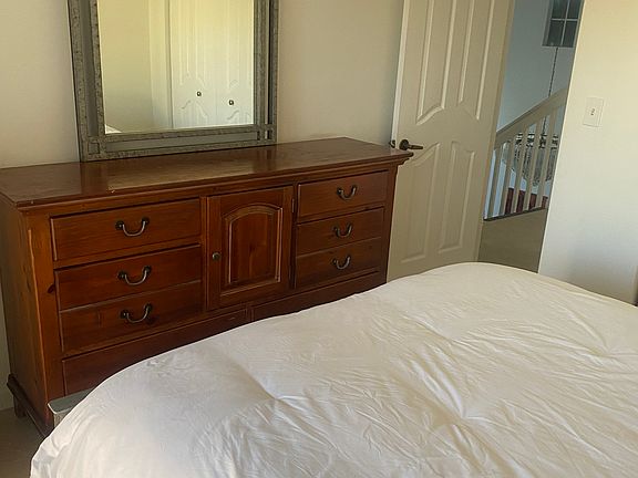 Bedroom 1 Queen Size with access to share Balcony with roommate.