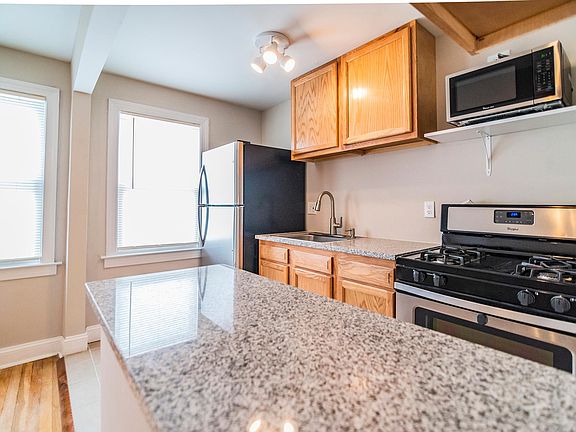 Updated kitchen, stainless steep appliances, granted counter tops, eat-in countertop