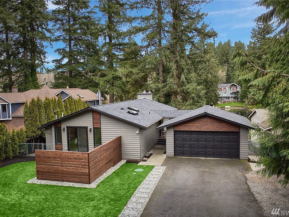 Affordable waterfront living at Lake Marcel! Daylight rambler with 2 car garage, RV parking as well as additional off-street parking.