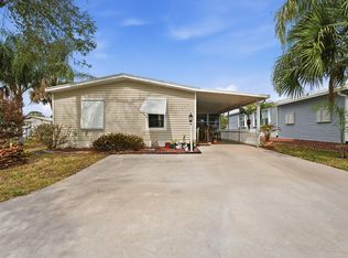 566 Dolphin Circle, Barefoot Bay, FL 32976