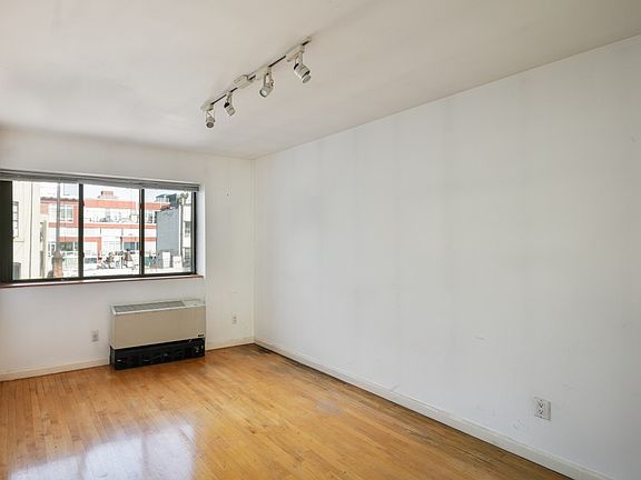 5th image of 421 E 12th St APT 9