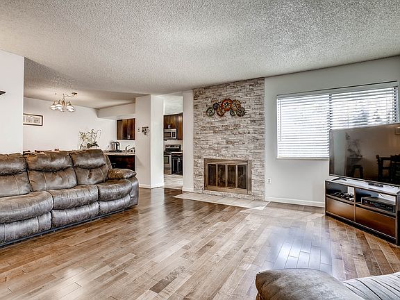 STONE FEATURE WOOD FIREPLACE
