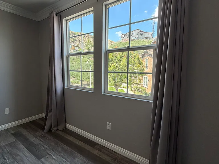 Enjoy scenic mountain views and abundant natural light from the living room.