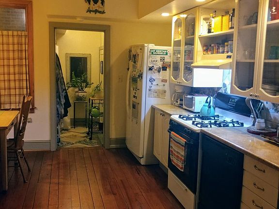 Kitchen looking towards side entrance foyer