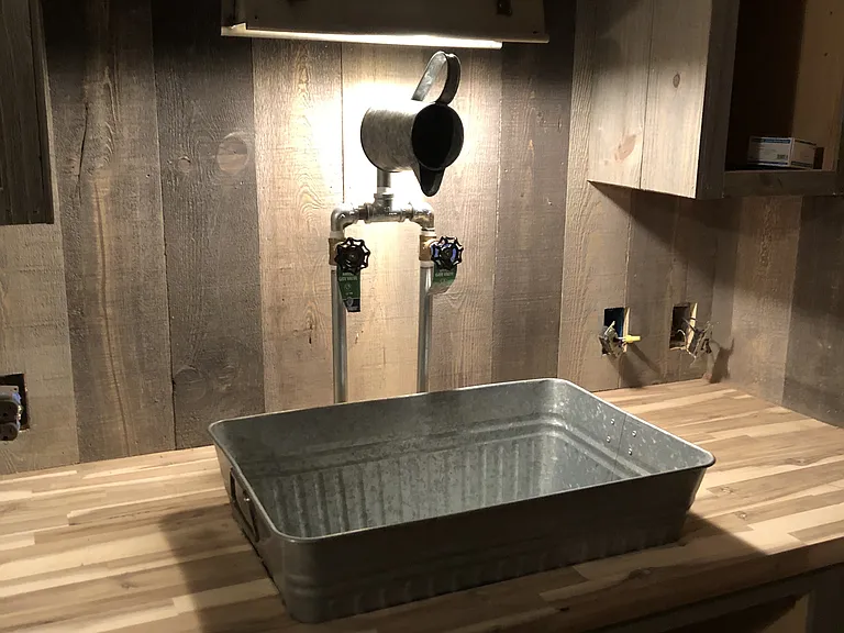 Updated kitchen sink and faucet