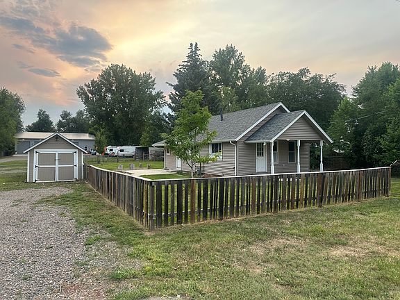 House and detached shed to the left are for lease