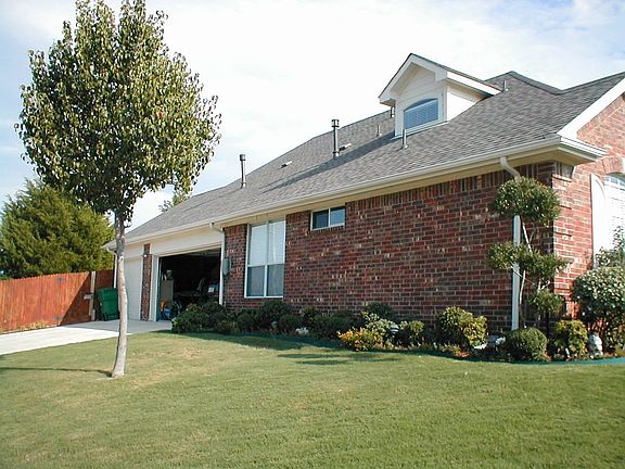 Side View of House 3 Car Garage