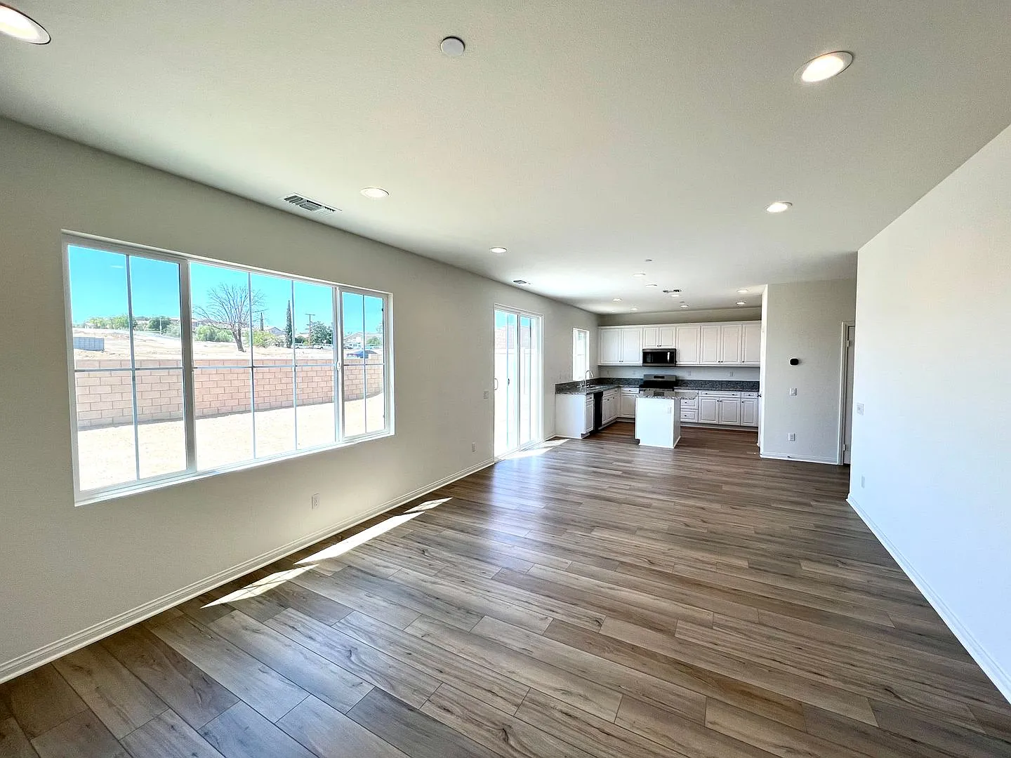 Newer 2022-Built, 4BR Home with Solar, Loft, Downstairs Bedroom, and Backyard — Photo 3