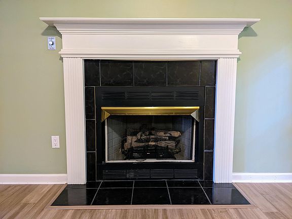 tenant responsible for getting propane tank hooked up to fireplace (there's a concrete pad and connection outside)