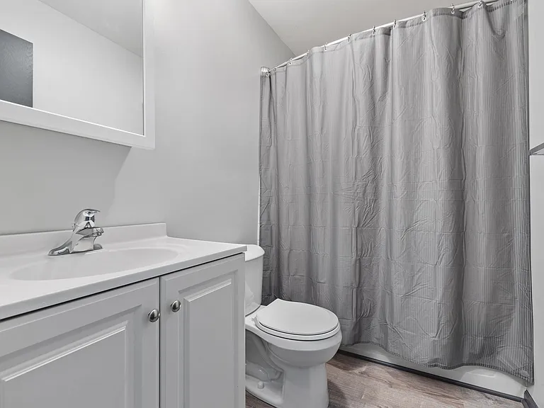 BATHROOM - New Floors, Sink, Vanity, Medicine cabinet, Faucet, towel bars, Lights. Curved shower curtain rod. Great water pressure.