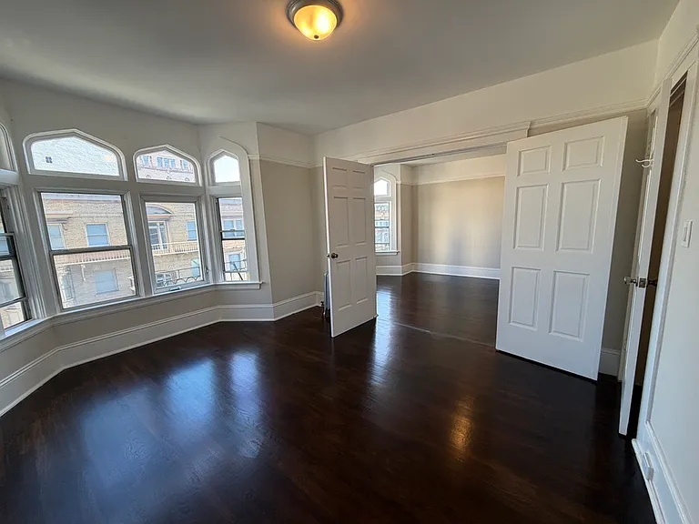 Communicating rooms with doors open.