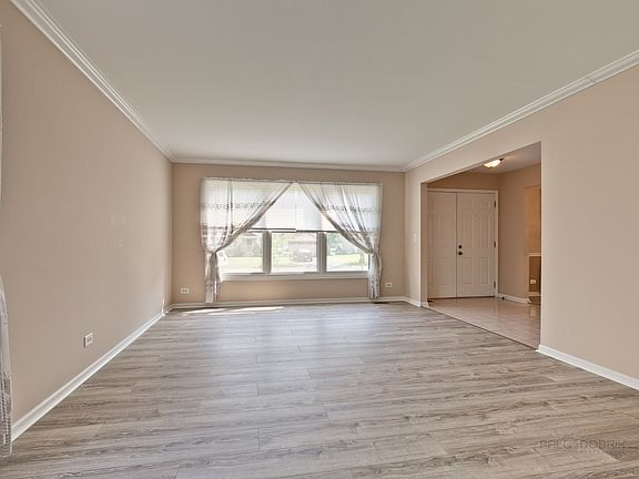 Another view of the living room looking out the front window.