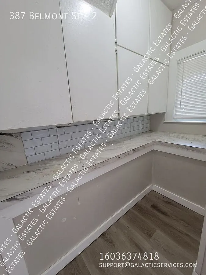 3 bed 1 bath 2nd floor apartment with deck, 3 season room, and large storage room — Photo 2