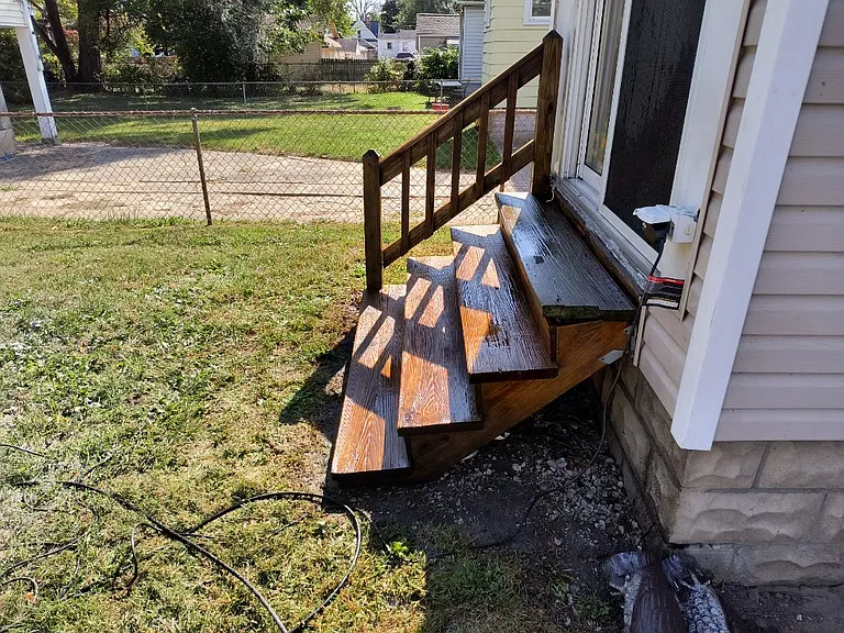 Back of house, sliding door.