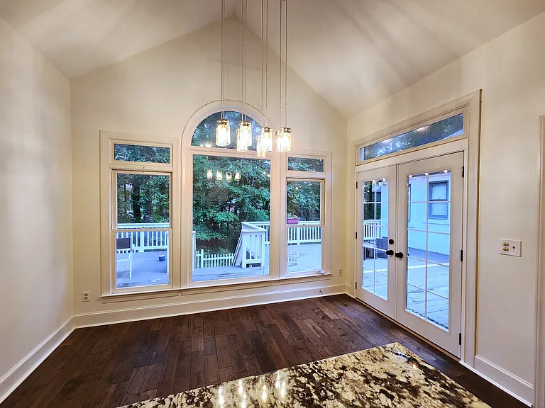 Breakfast nook overlooking the deck. Great space to enjoy a sunlit breakfast.
