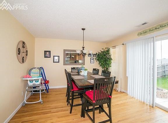 Dining area off kitchen with walkout to back yard patio.