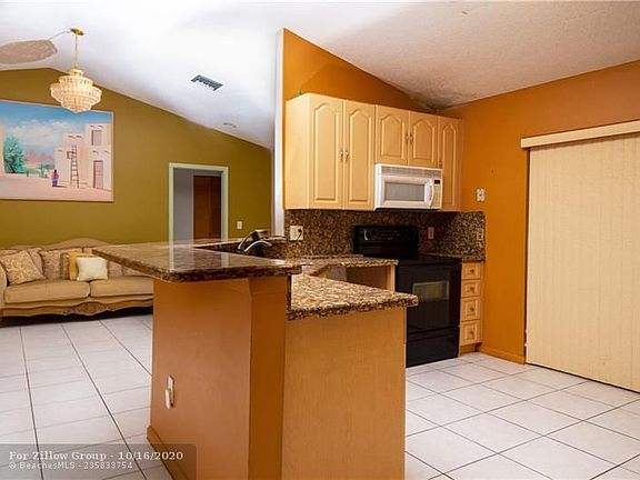 4th image of 321 NW 47th Ter