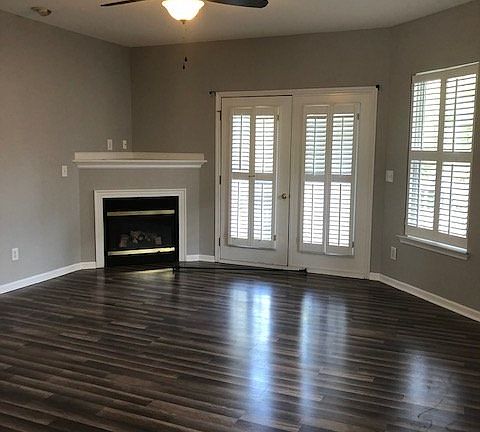 living room - see door to wrap around porch