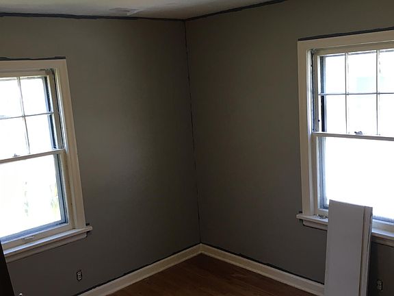 Fresh paint and new lighting in bedrooms
