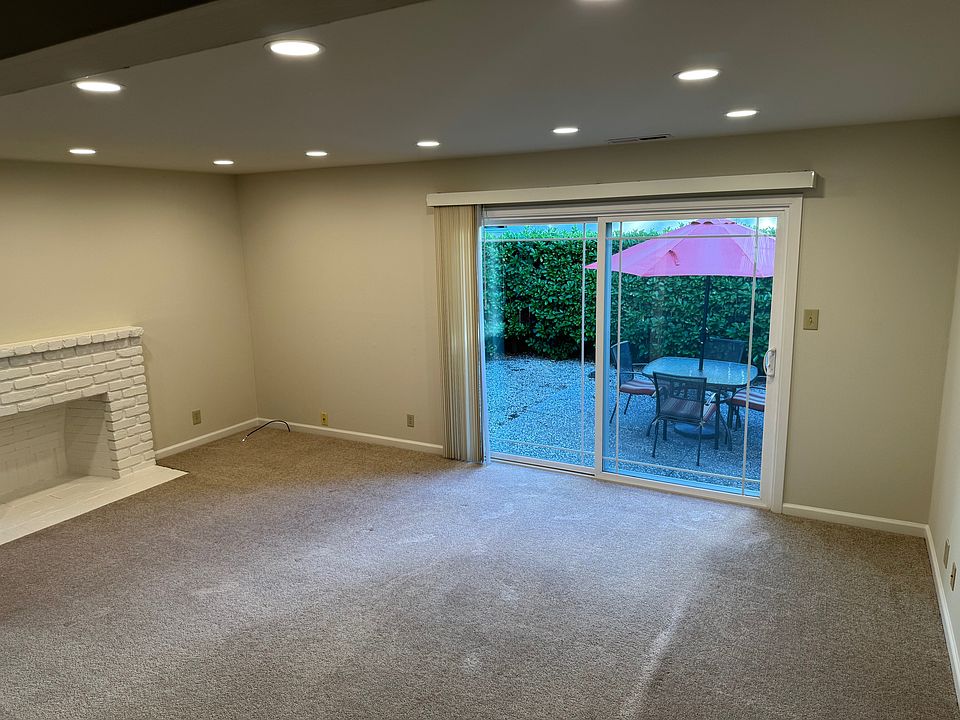 Living room with patio access.