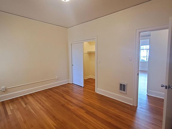 BEDROOM WITH LARGE WALK IN CLOSET