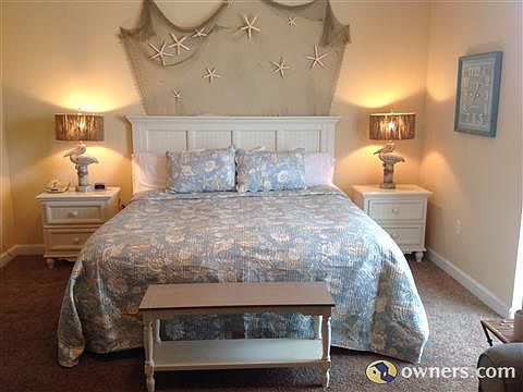 King bed with Beautiful beachy decor