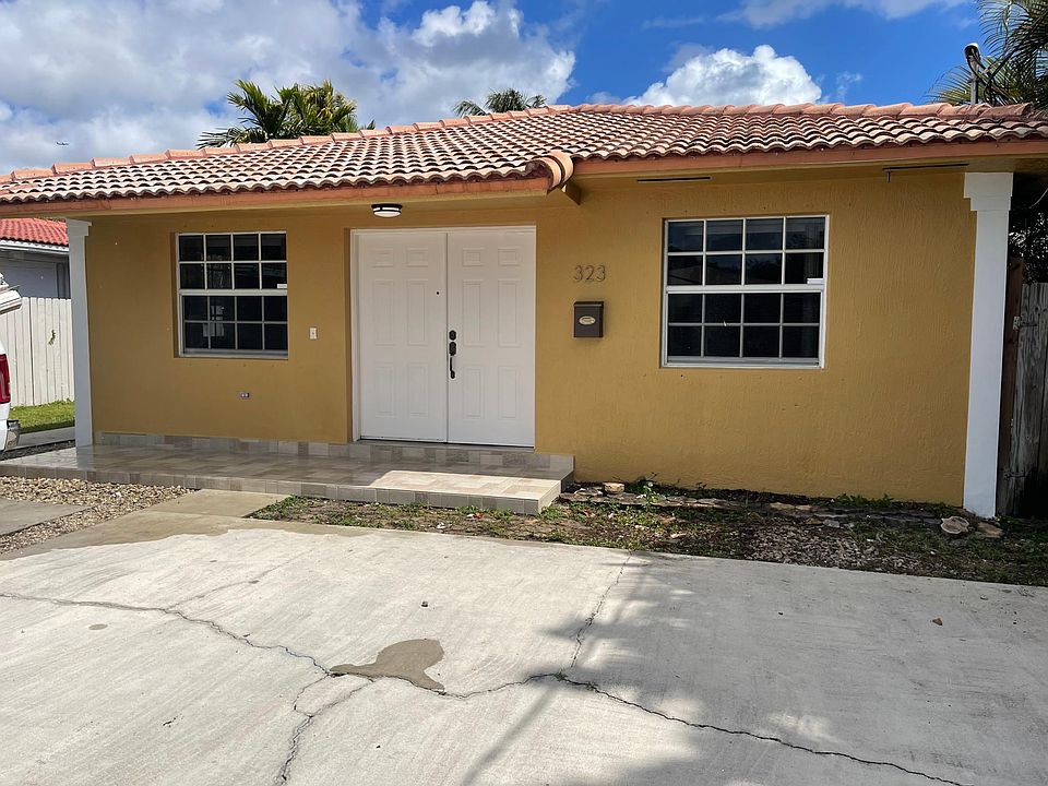 Front of the duplex with the assigned 2 parking spaces.