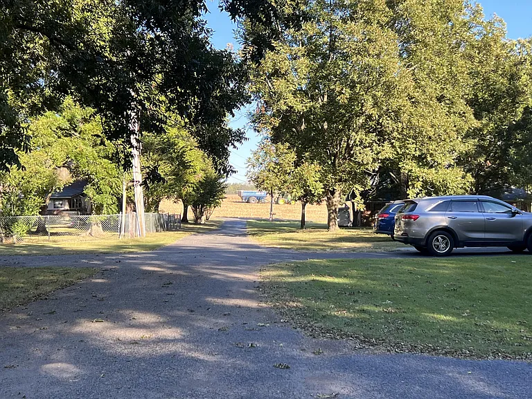 Looking down the driveway from the apartment