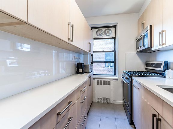 5th image of 66-15 Wetherole St #D6