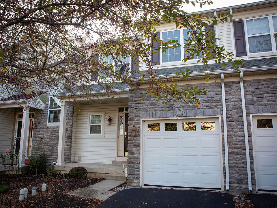 1 car attached garage with large driveway to accommodate up to 3 cars