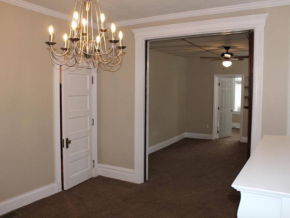 Dining Room looking towards the Living Room and Walk-In Closet (left door)