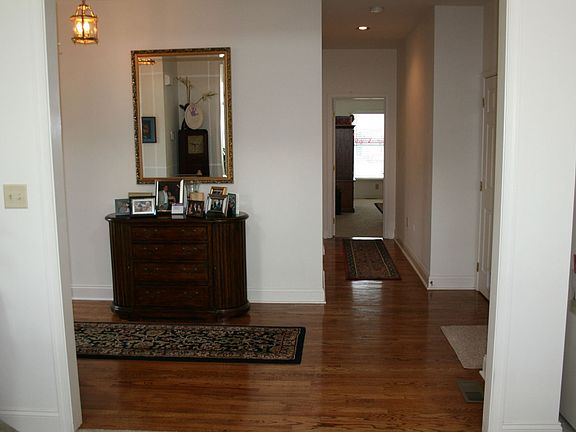 Beatiful hardwood floors from the foyer into the hall.