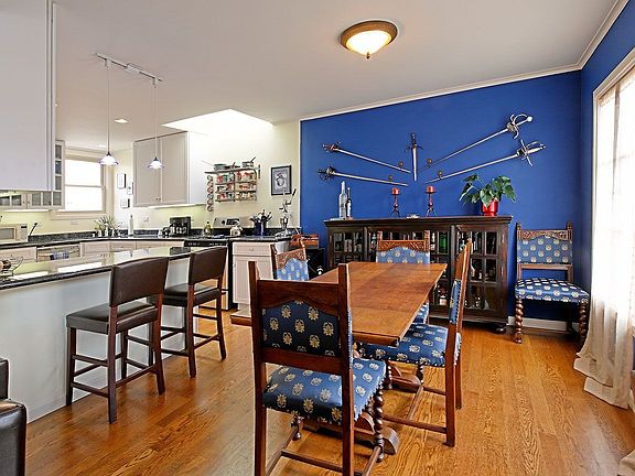 Dining Room with Great Light Opens to Living Room