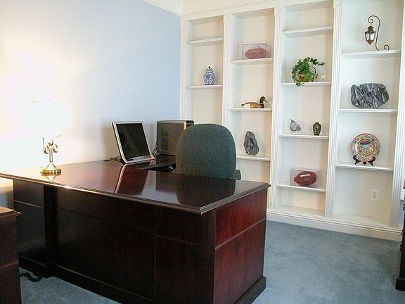 Study with built-in shelves