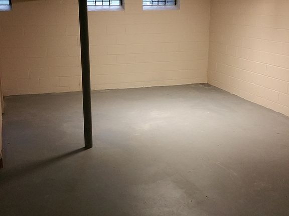 turn this finished basement into a man cave, office and pla