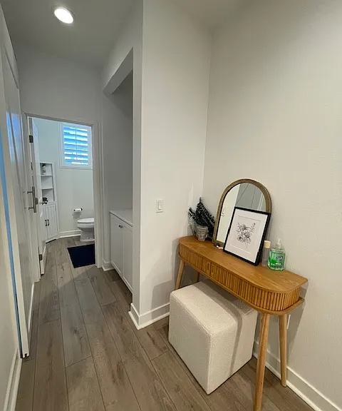 Hallway leading to 1st bedroom and hall bath.