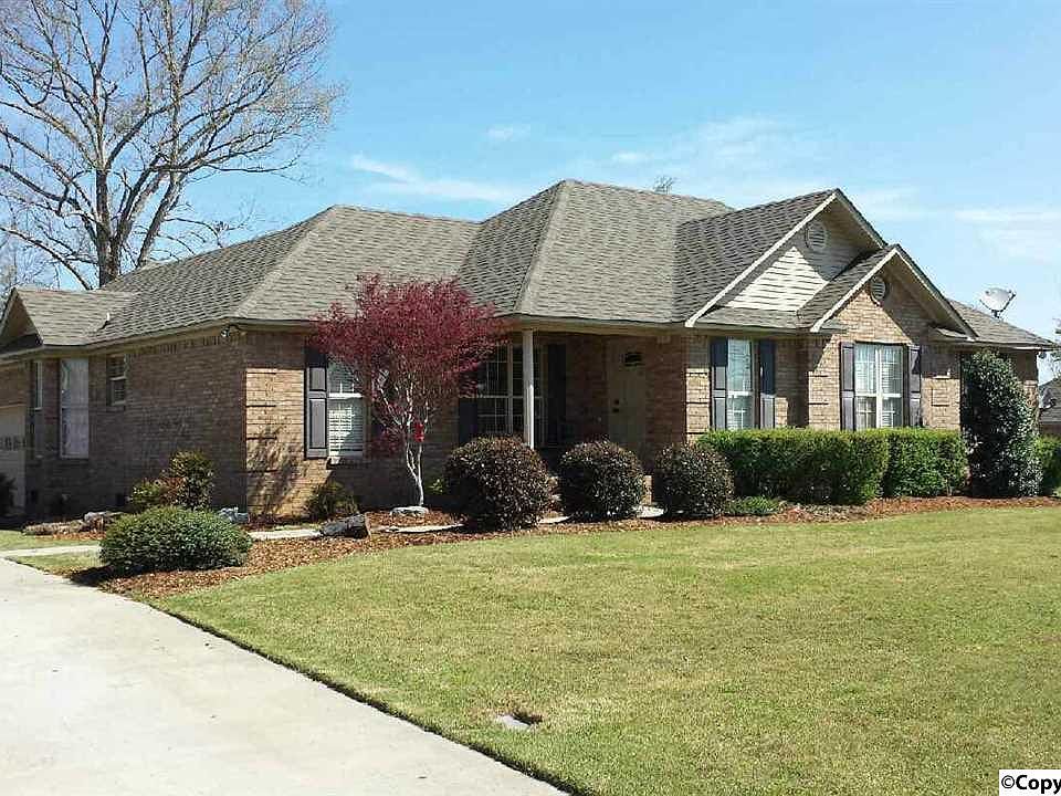 Front view, yard has irrigation