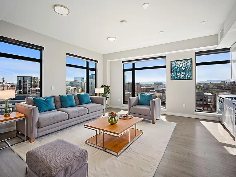 Natural light floods into your spacious living room, offering a warm and inviting atmosphere.
