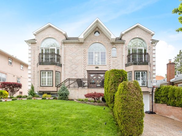 house built into hill for sale