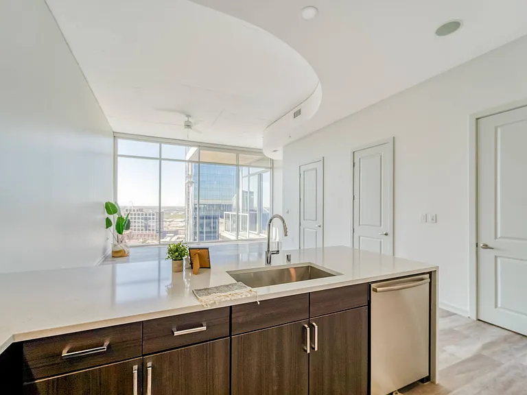 From morning coffee to movie nights, this light-filled space is designed for comfort