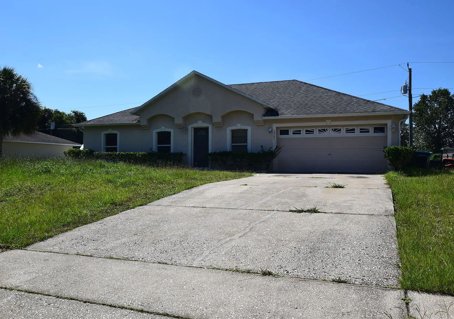 This charming 4 Bedroom, 2 Bath Single Family Home For Rent at 3785 Trade St. Deltona, FL 32738 — Photo 1