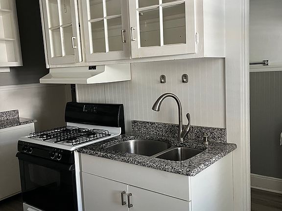 Beautiful kitchen cabinets, solid surface counters, gas stove