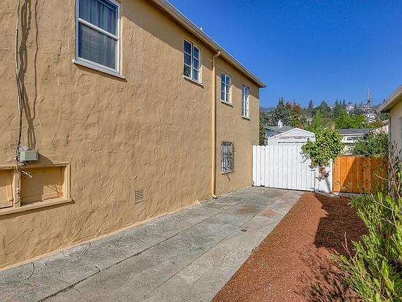 Driveway: Off Street Parking for Multiple Cars (view toward private backyard)