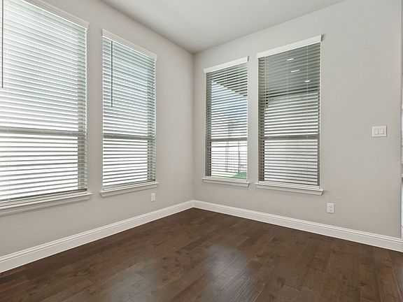 Dining room in the Cabernet home plan by Trophy Signature Homes - REPRESENTATIVE PHOTO