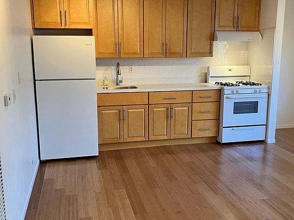 New cabinets, quartz counter, sink:backsplash