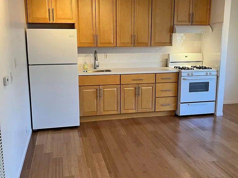 New cabinets, quartz counter, sink:backsplash