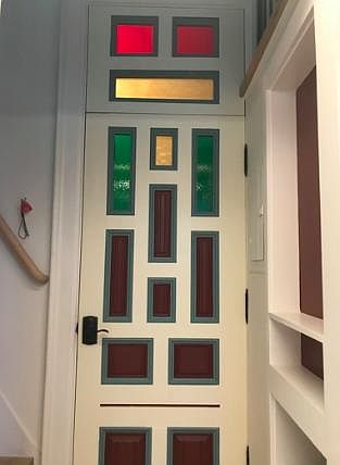 Entry door (original 1895 Victorian). Stairs to the loft on the left side
