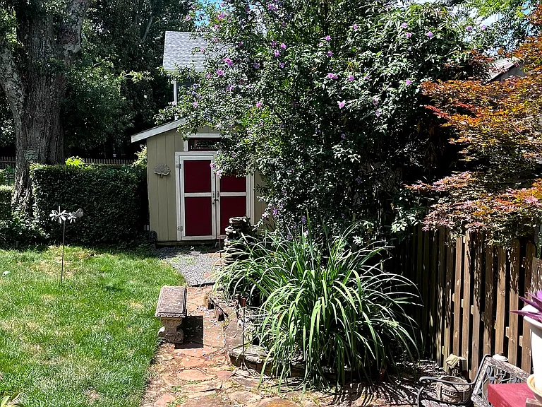 Rear, shed, pond and fountain