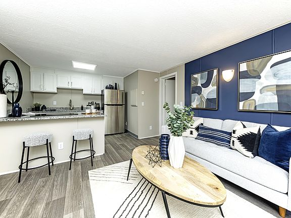 Spacious Living Room with Wood Style Flooring